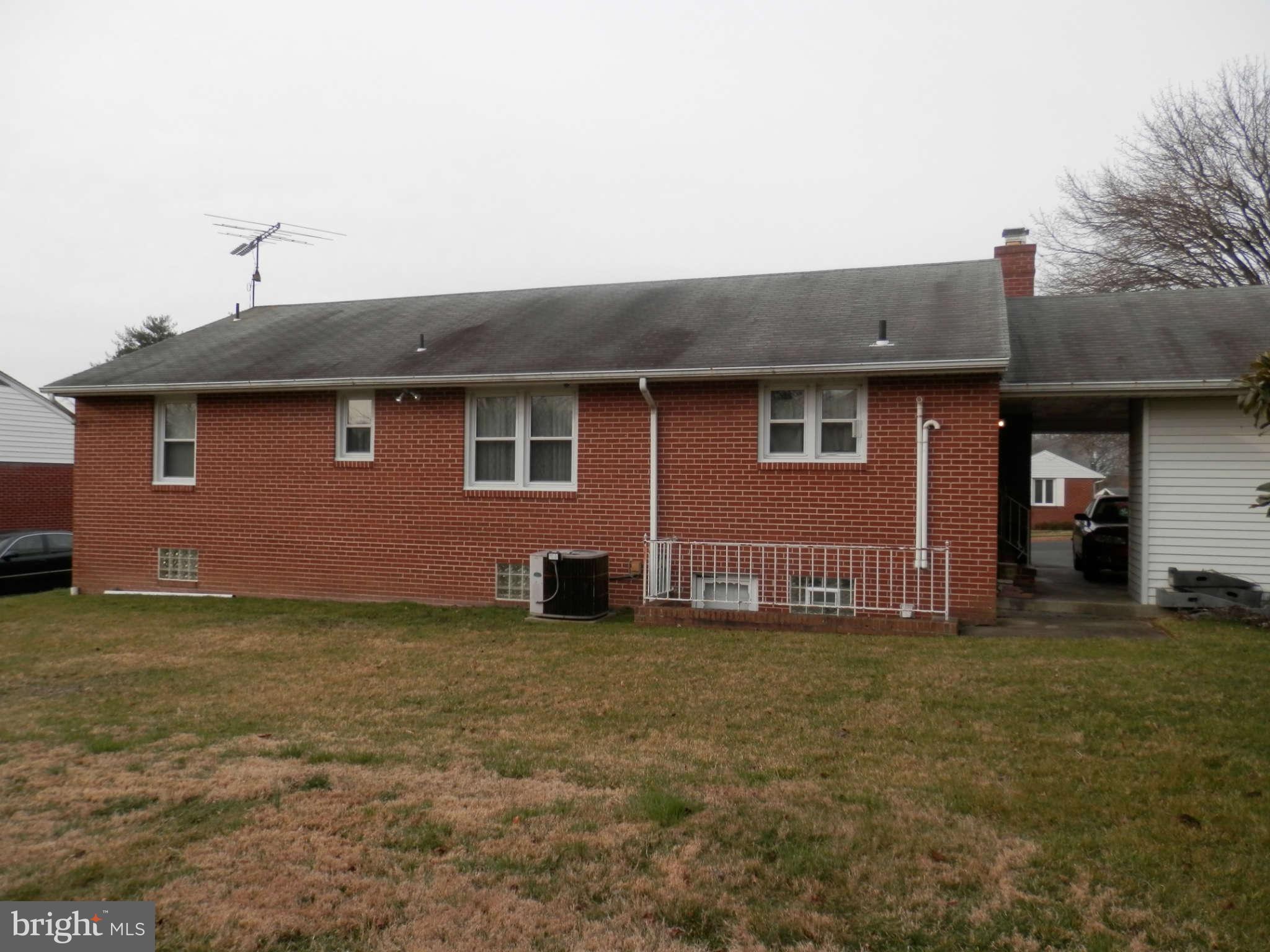9400 Dawnvale Road Baltimore, MD 21236 - Photo 4 of 5 a front view of a house with a yard