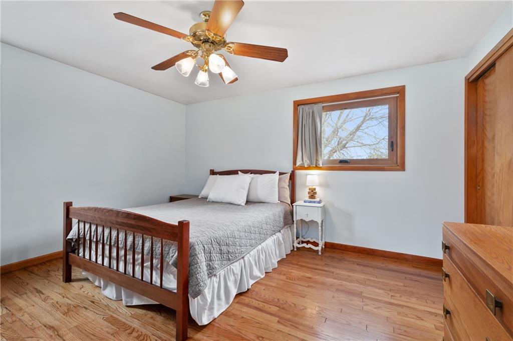 419 Amherst Avenue Coraopolis, PA 15108 - Photo 16 of 29 a bedroom with bed and a chandelier