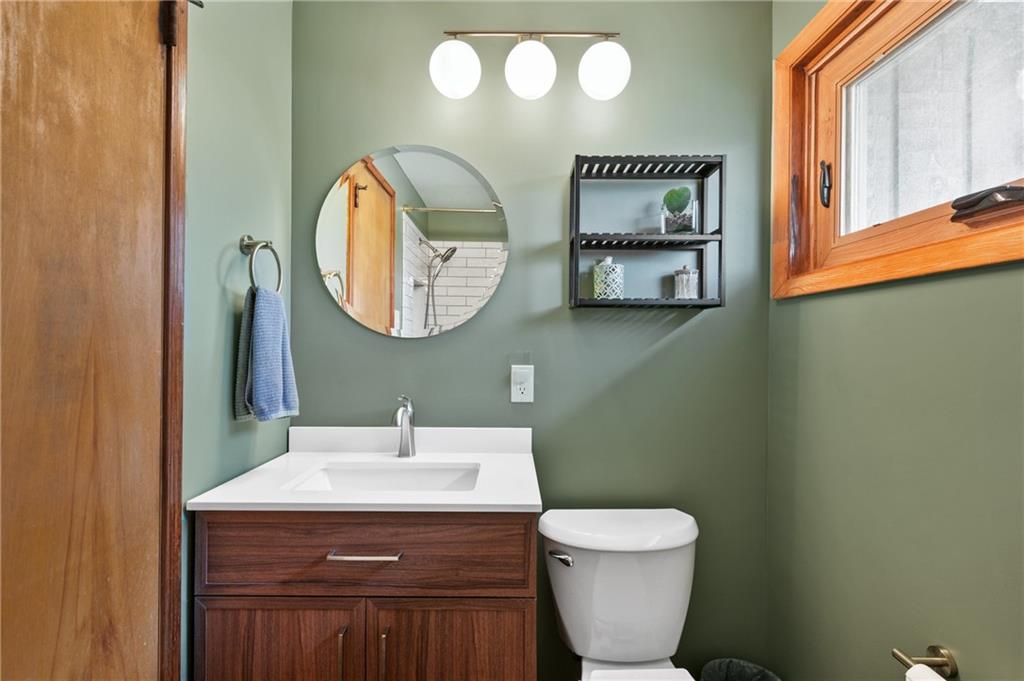 419 Amherst Avenue Coraopolis, PA 15108 - Photo 21 of 29 a bathroom with a toilet sink and mirror