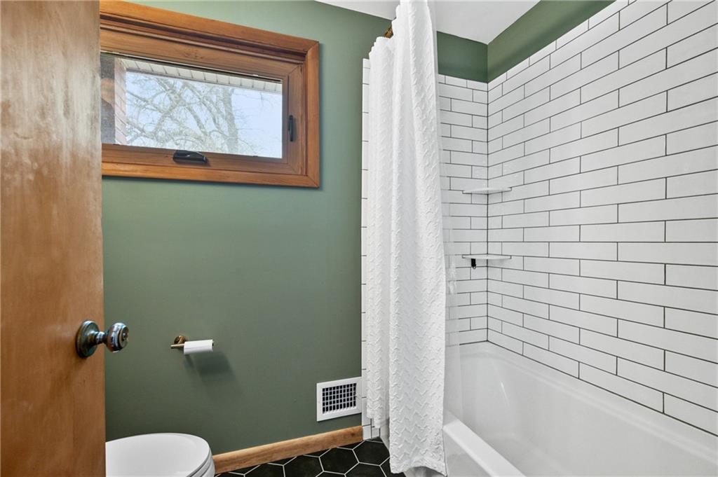 419 Amherst Avenue Coraopolis, PA 15108 - Photo 22 of 29 a bathroom with a toilet and a shower