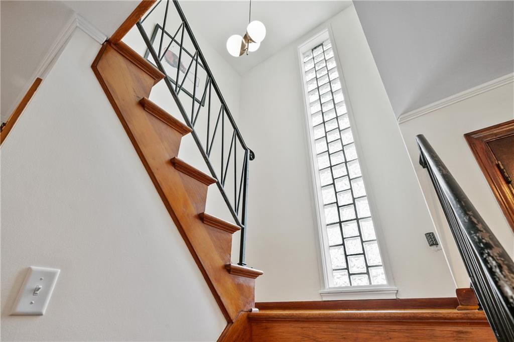 419 Amherst Avenue Coraopolis, PA 15108 - Photo 23 of 29 a view of staircase with white walls and a window