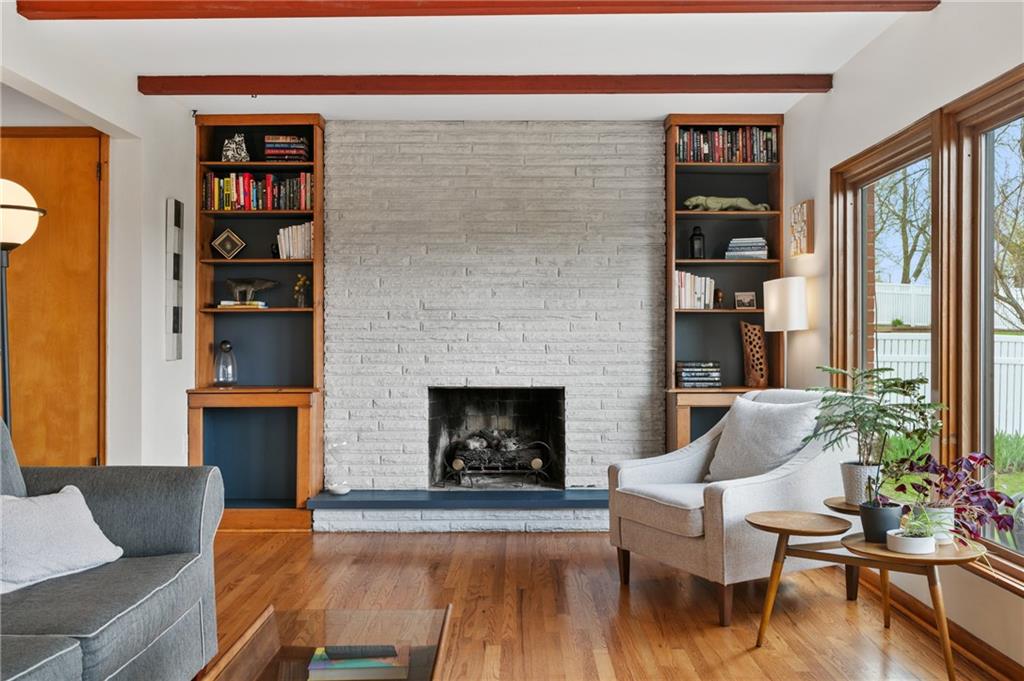 419 Amherst Avenue Coraopolis, PA 15108 - Photo 3 of 29 a living room with furniture and a fireplace