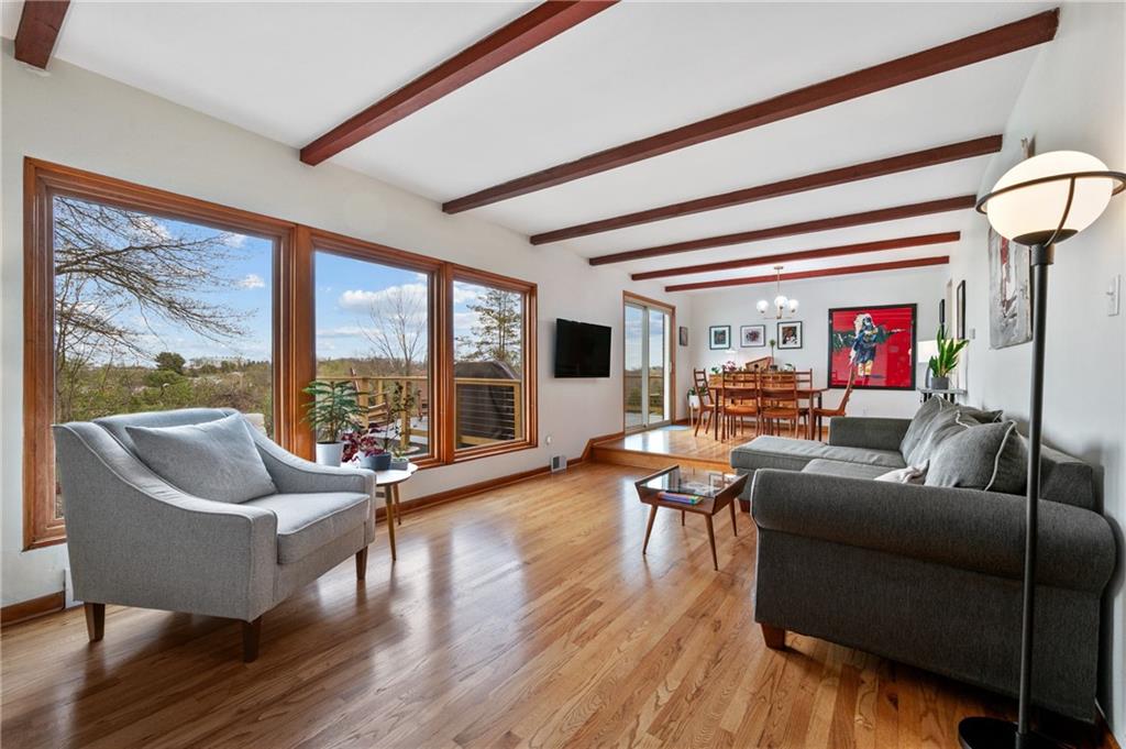 419 Amherst Avenue Coraopolis, PA 15108 - Photo 4 of 29 a living room with furniture and a large window