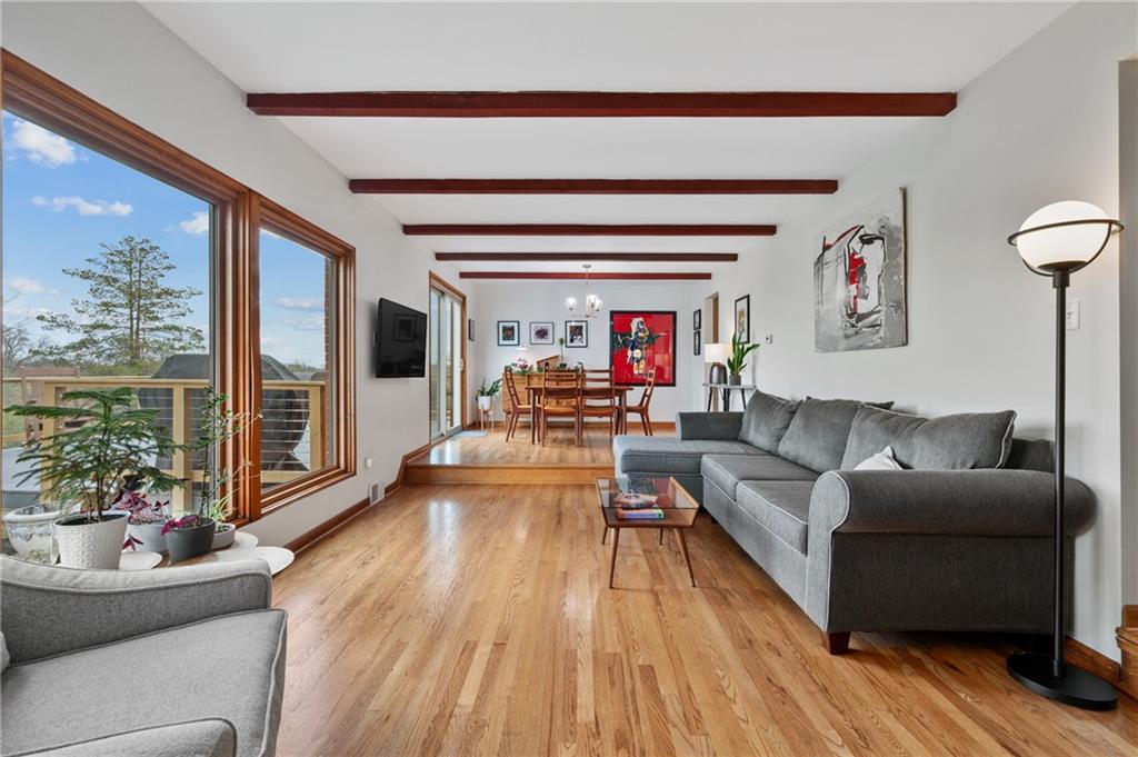 419 Amherst Avenue Coraopolis, PA 15108 - Photo 5 of 29 a living room with furniture and a large window