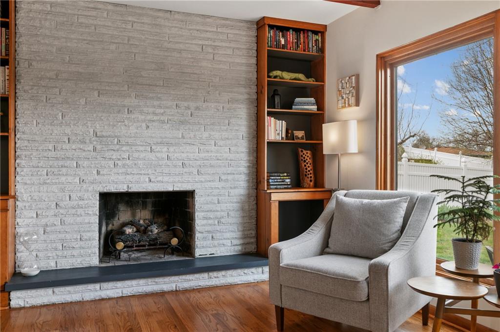 419 Amherst Avenue Coraopolis, PA 15108 - Photo 8 of 29 a living room with furniture and a fireplace