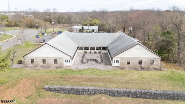 a view of a cars park in front of house