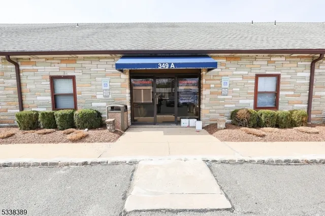 a view of a porch with a bench