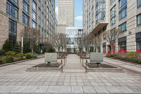 a view of a building with sitting area
