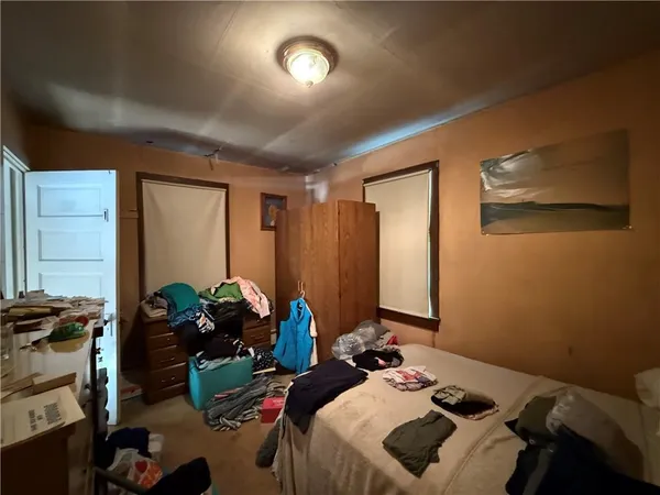 a room with furniture and a window