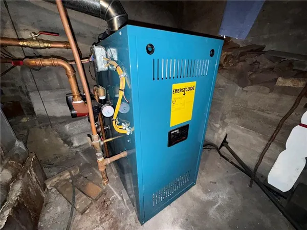 a bed room with a bed and a television