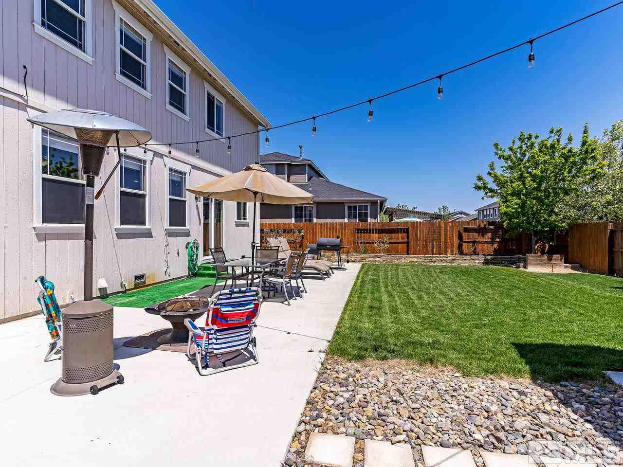 8976 Wynne Street Reno, NV 89506 - Photo 11 of 24 a garden view with a seating space
