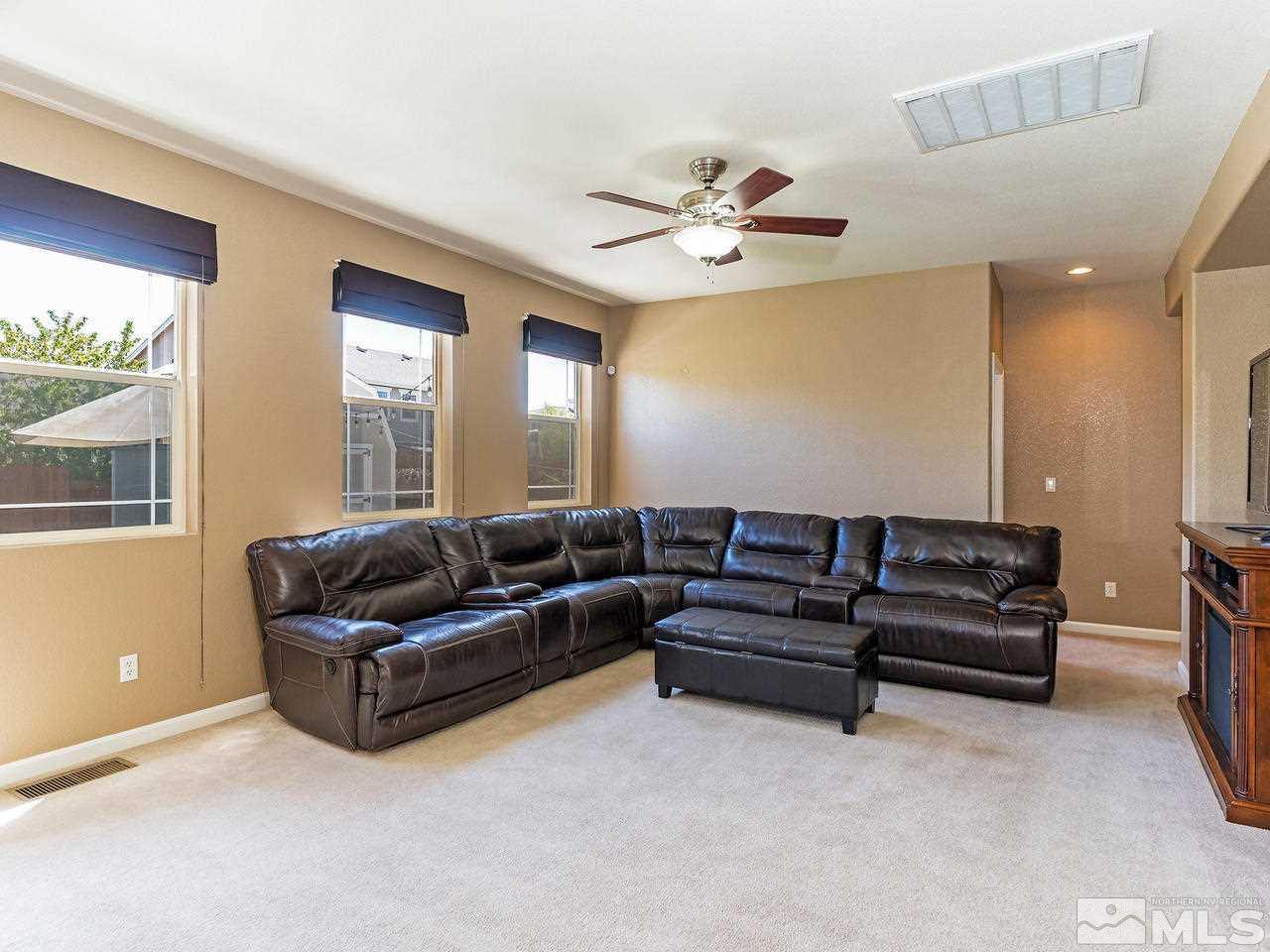 8976 Wynne Street Reno, NV 89506 - Photo 5 of 24 a living room with furniture and a window