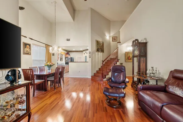 a view of a livingroom with furniture and wooden floor