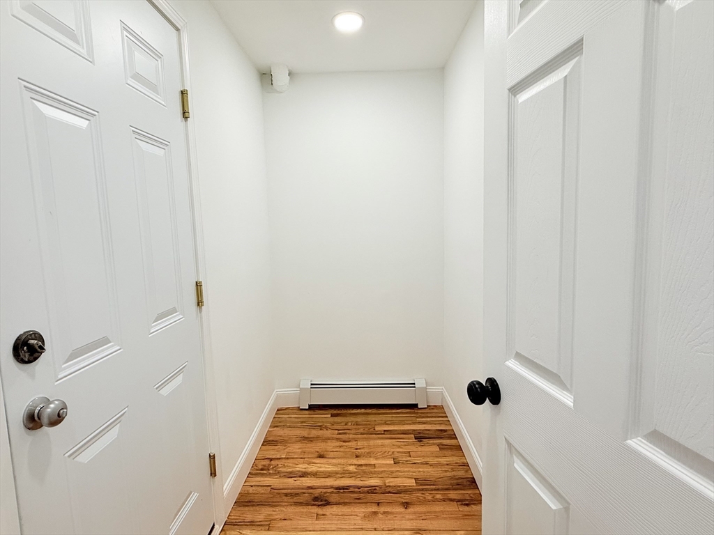 23 Bellevue Street, Unit 1 Worcester, MA 01609 - Photo 11 of 22 a bathroom with a tub and shower