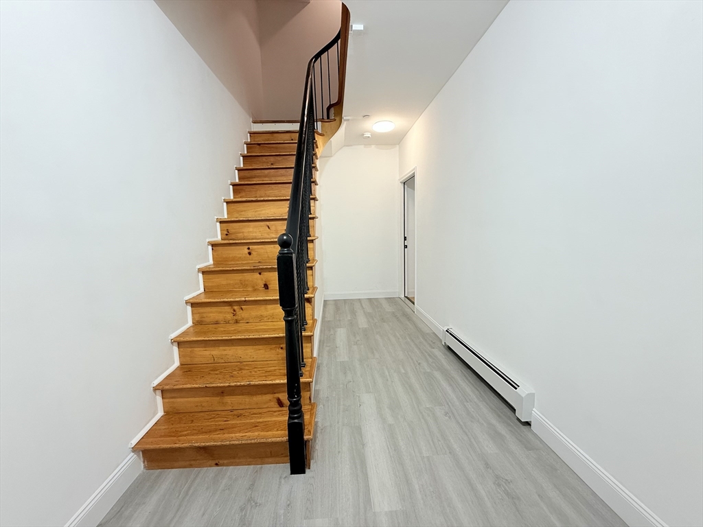 23 Bellevue Street, Unit 1 Worcester, MA 01609 - Photo 4 of 22 a view of entryway with stairs