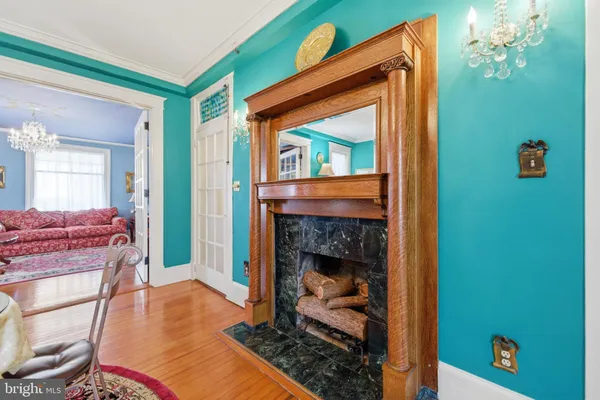 a living room with lots of furniture and a flat screen tv