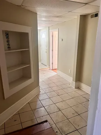 a view of a livingroom with wooden floor