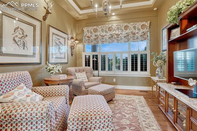 1935 Bashley Road Monument, CO 80132 - Photo 18 of 45 Tucked away upstairs is a flex space with classic wood shutters, French doors and abundant natural light. Great as a private office or TV nook