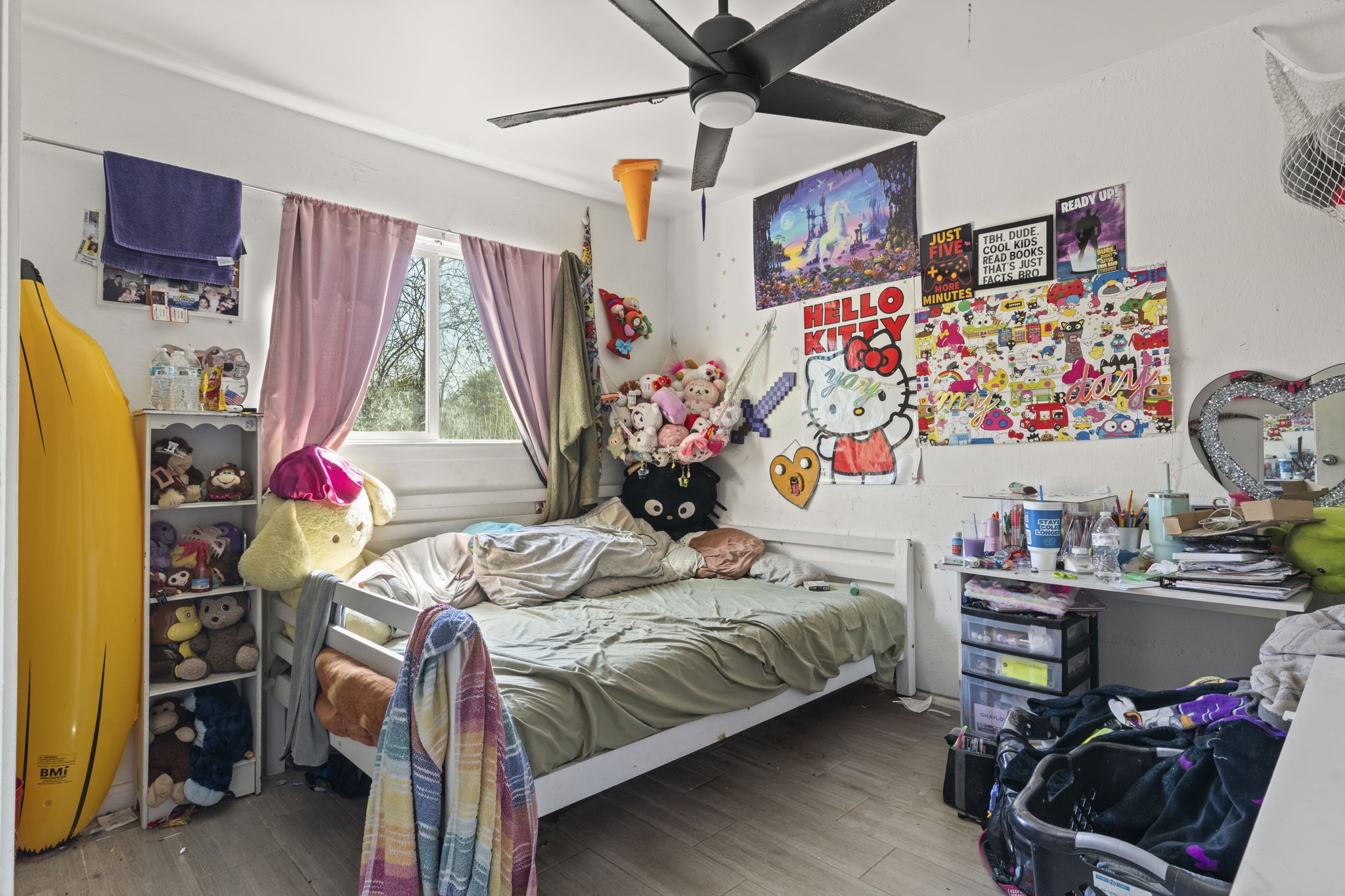 8506 Rivercross Road Houston, TX 77064 - Photo 22 of 32 a bedroom with a bed and a window