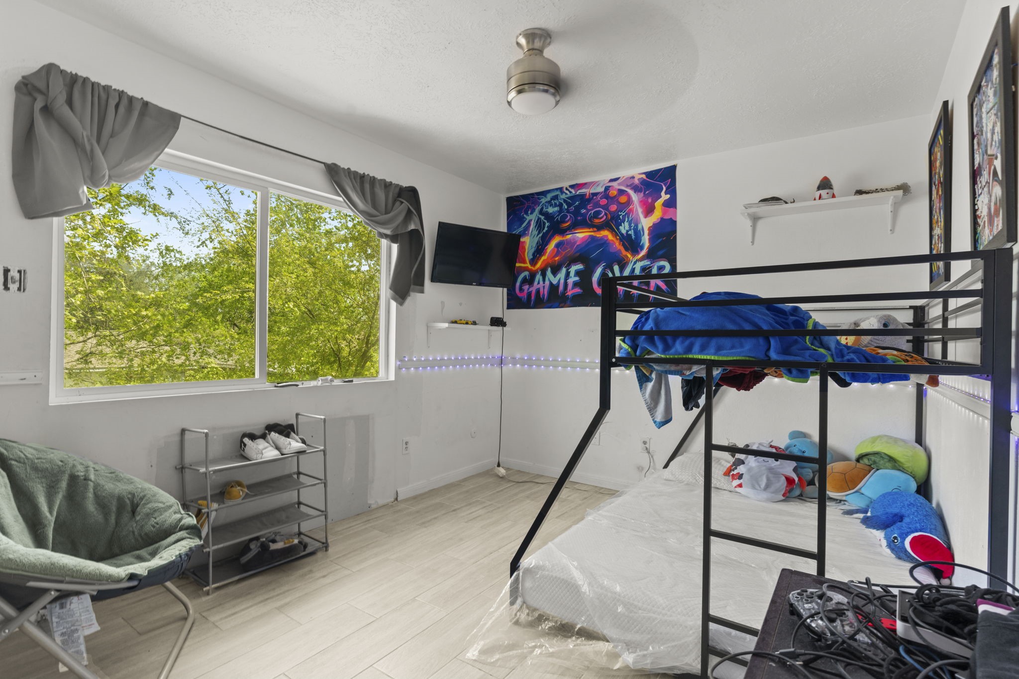 8506 Rivercross Road Houston, TX 77064 - Photo 27 of 32 a bedroom with furniture and a window