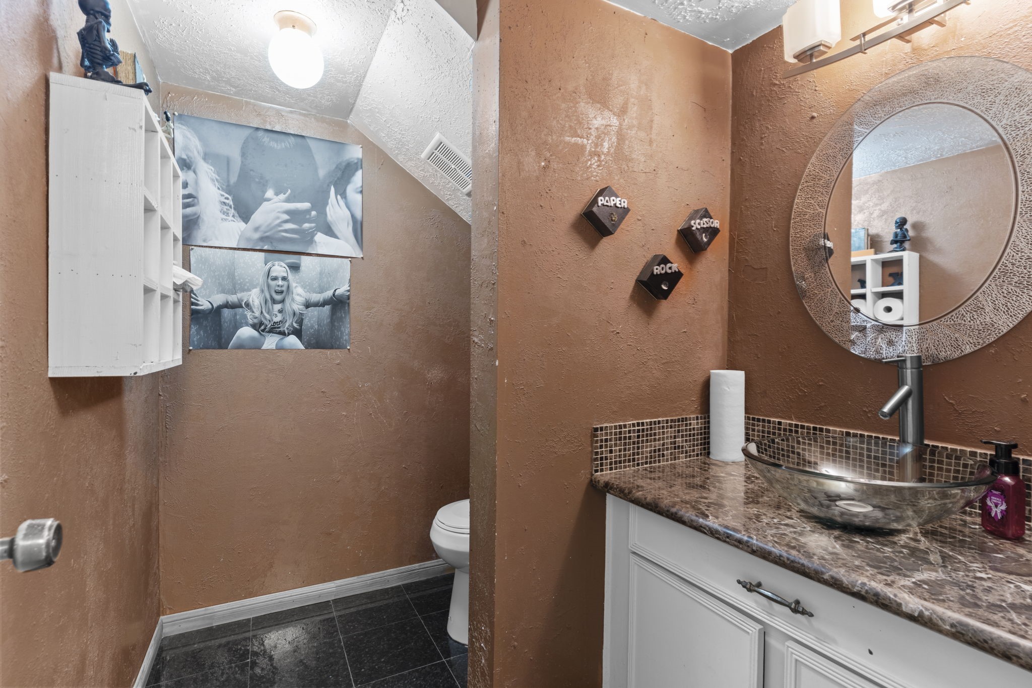 8506 Rivercross Road Houston, TX 77064 - Photo 28 of 32 a bathroom with a granite countertop sink and a mirror