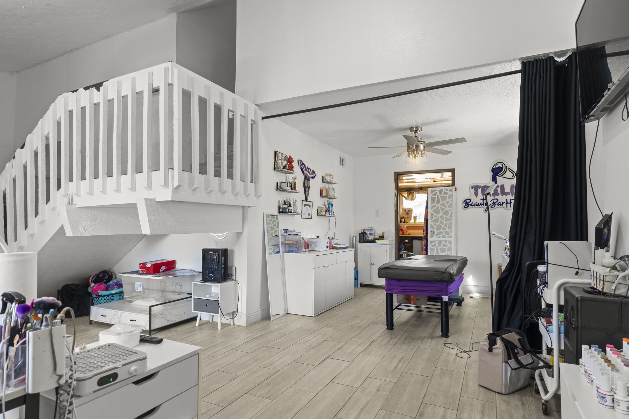 8506 Rivercross Road Houston, TX 77064 - Photo 7 of 32 a workspace with furniture and white walls