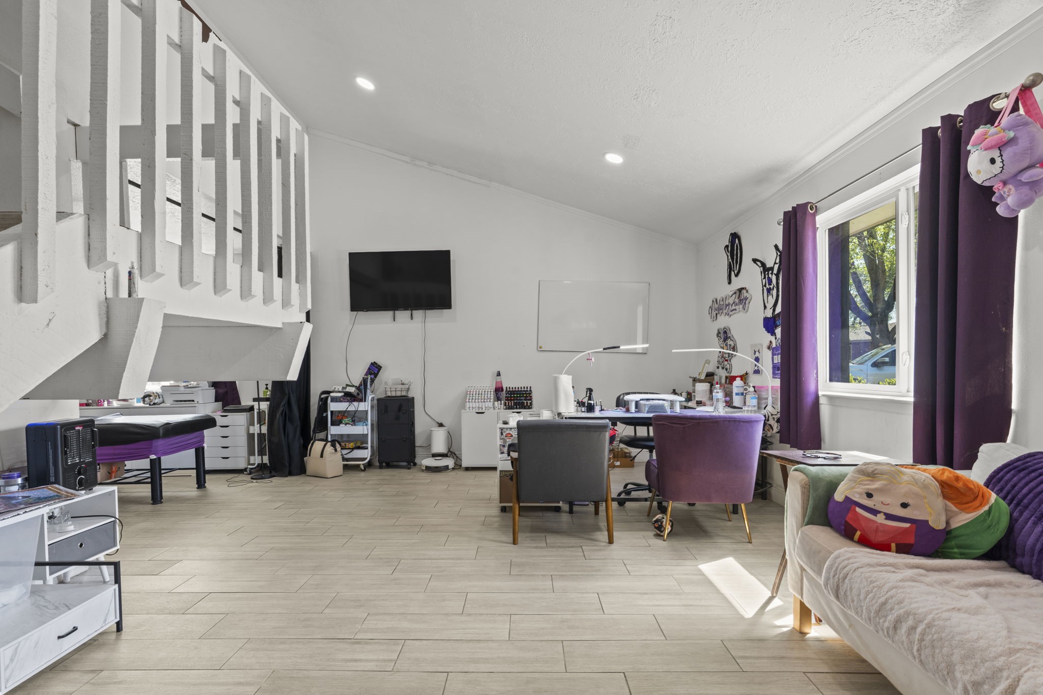 8506 Rivercross Road Houston, TX 77064 - Photo 10 of 32 a living room with furniture and a flat screen tv