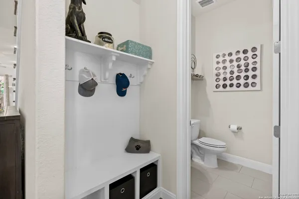 a bathroom with a toilet and a sink