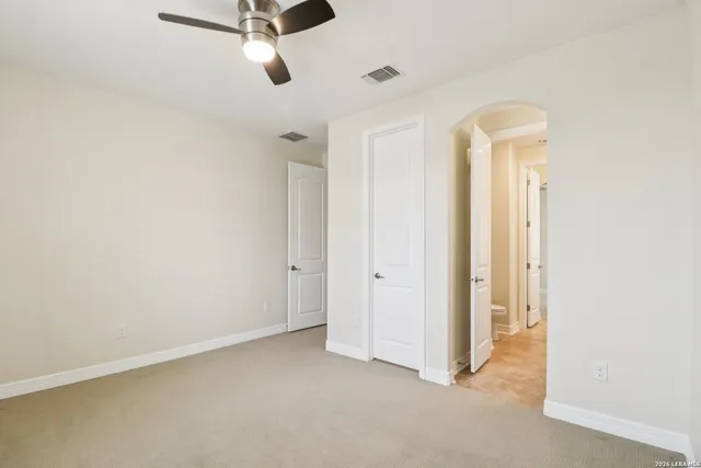 a view of a room with a wardrobe space