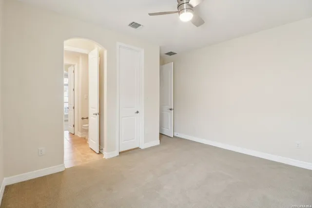 an empty room with a bathroom