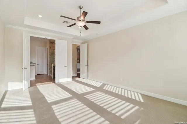 a view of a livingroom with a ceiling fan