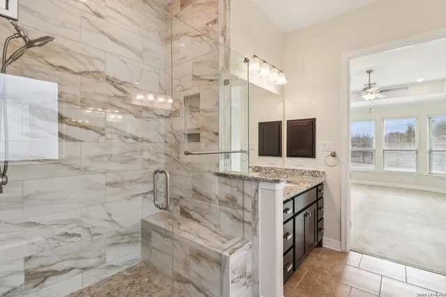 a bathroom with a sink and mirror