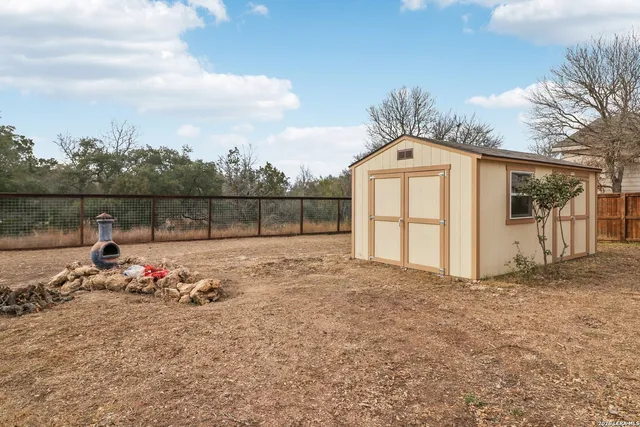 a view of a house with a garage