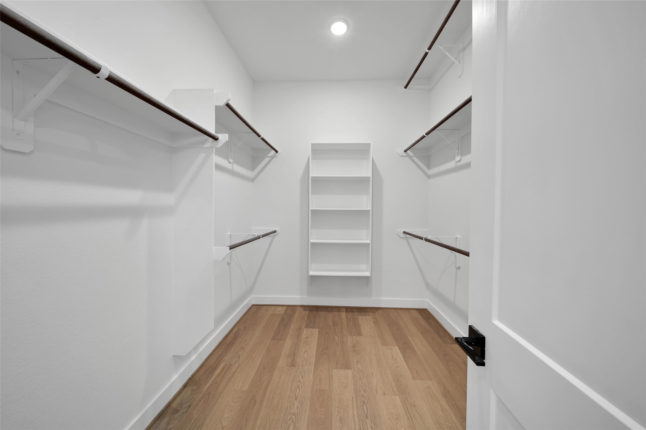 4404 Anthony Court Lane Seabrook, TX 77586 - Photo 13 of 36 a view of a room with empty racks