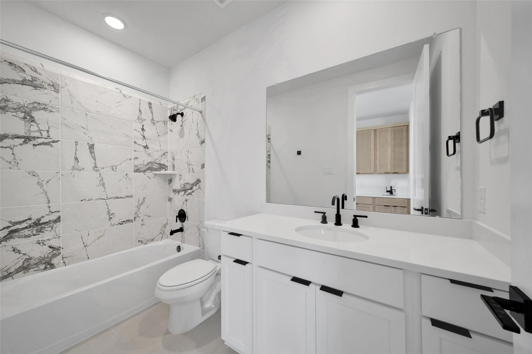 4404 Anthony Court Lane Seabrook, TX 77586 - Photo 22 of 36 a bathroom with a sink a toilet and shower