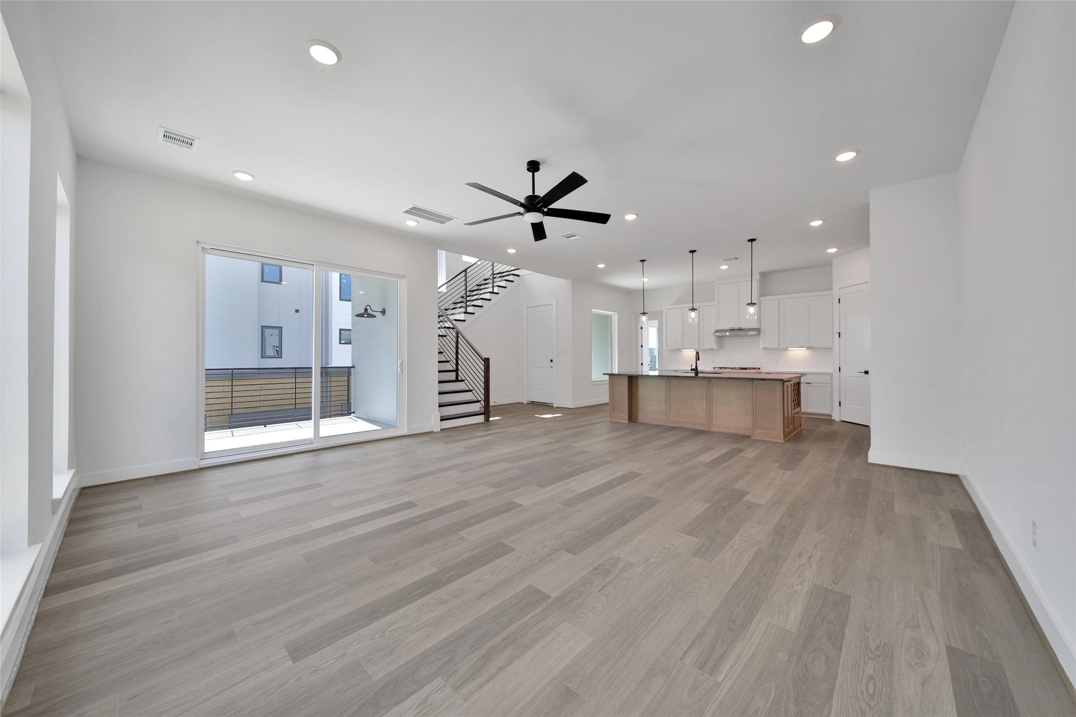 4404 Anthony Court Lane Seabrook, TX 77586 - Photo 5 of 36 a view of a kitchen with a sink and a refrigerator