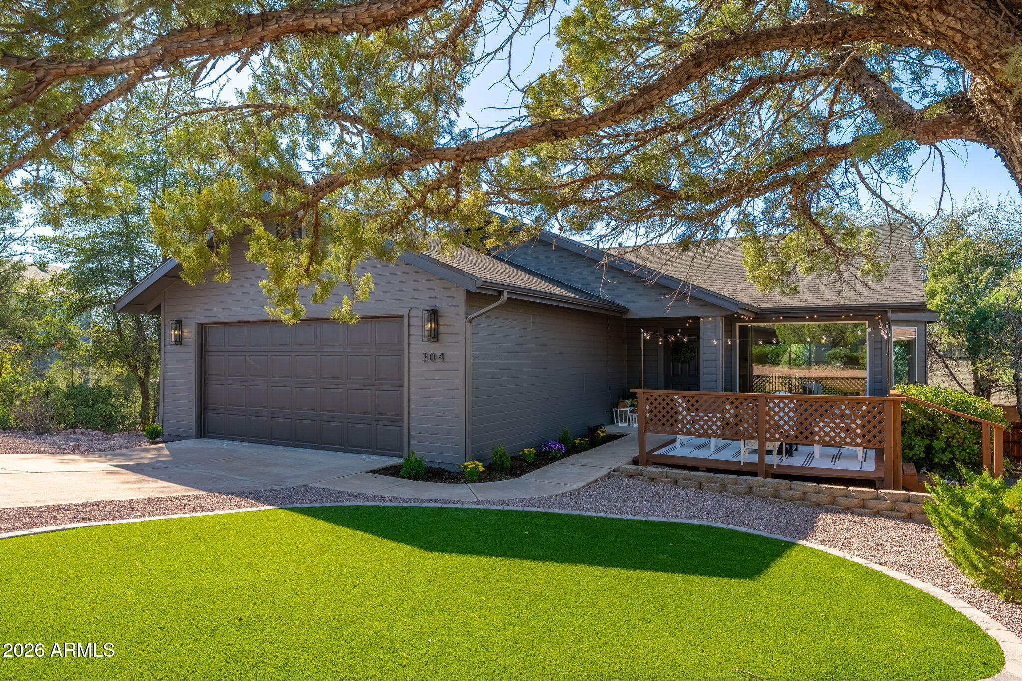 304 North Trailwood Road Payson, AZ 85541 - Photo 1 of 12 a front view of house with yard and outdoor seating