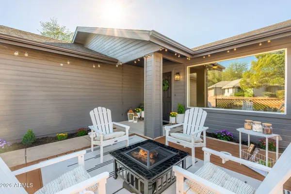 a living room with furniture and a window