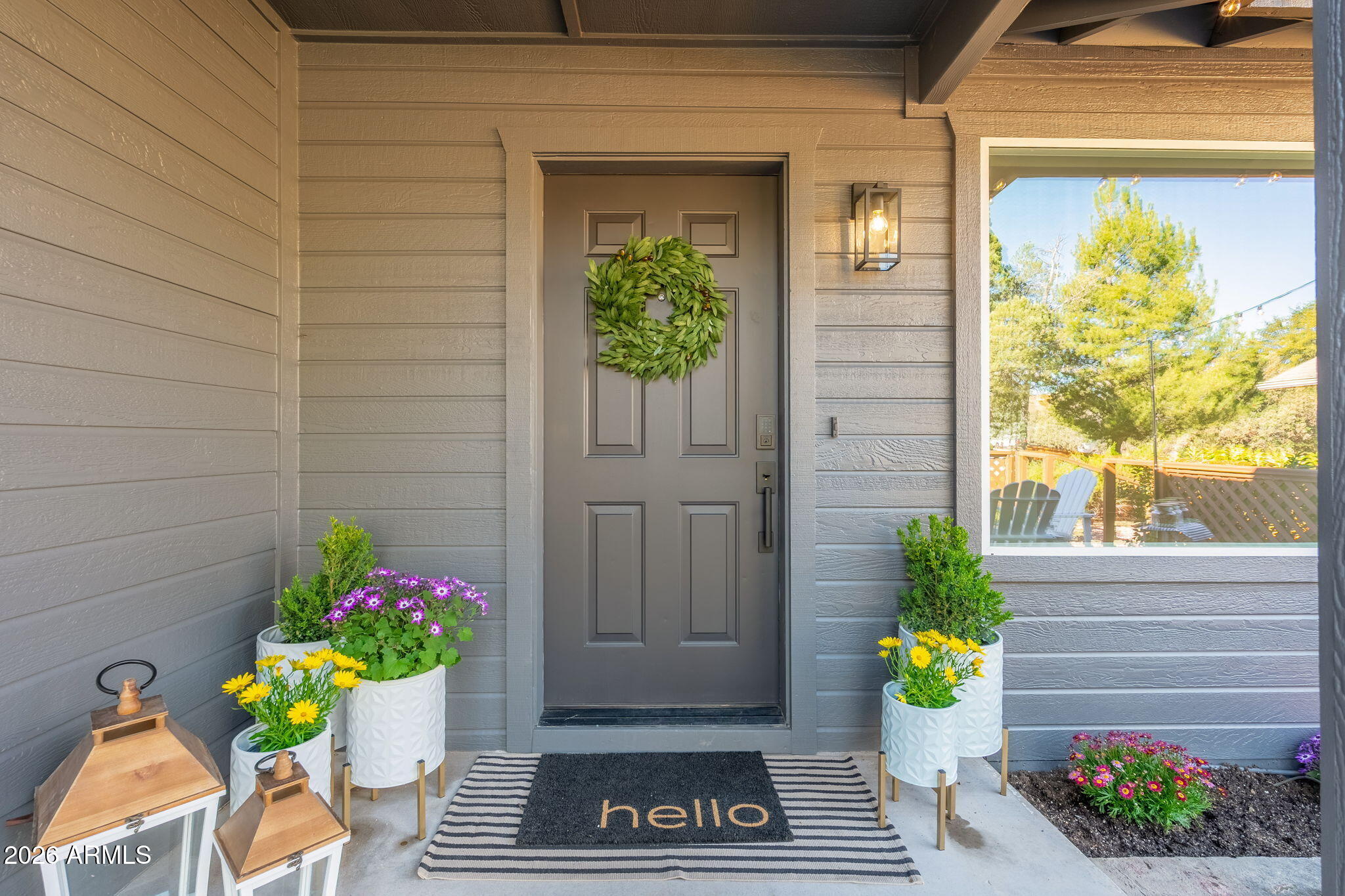 304 North Trailwood Road Payson, AZ 85541 - Photo 4 of 12 a front view of a house with a garden