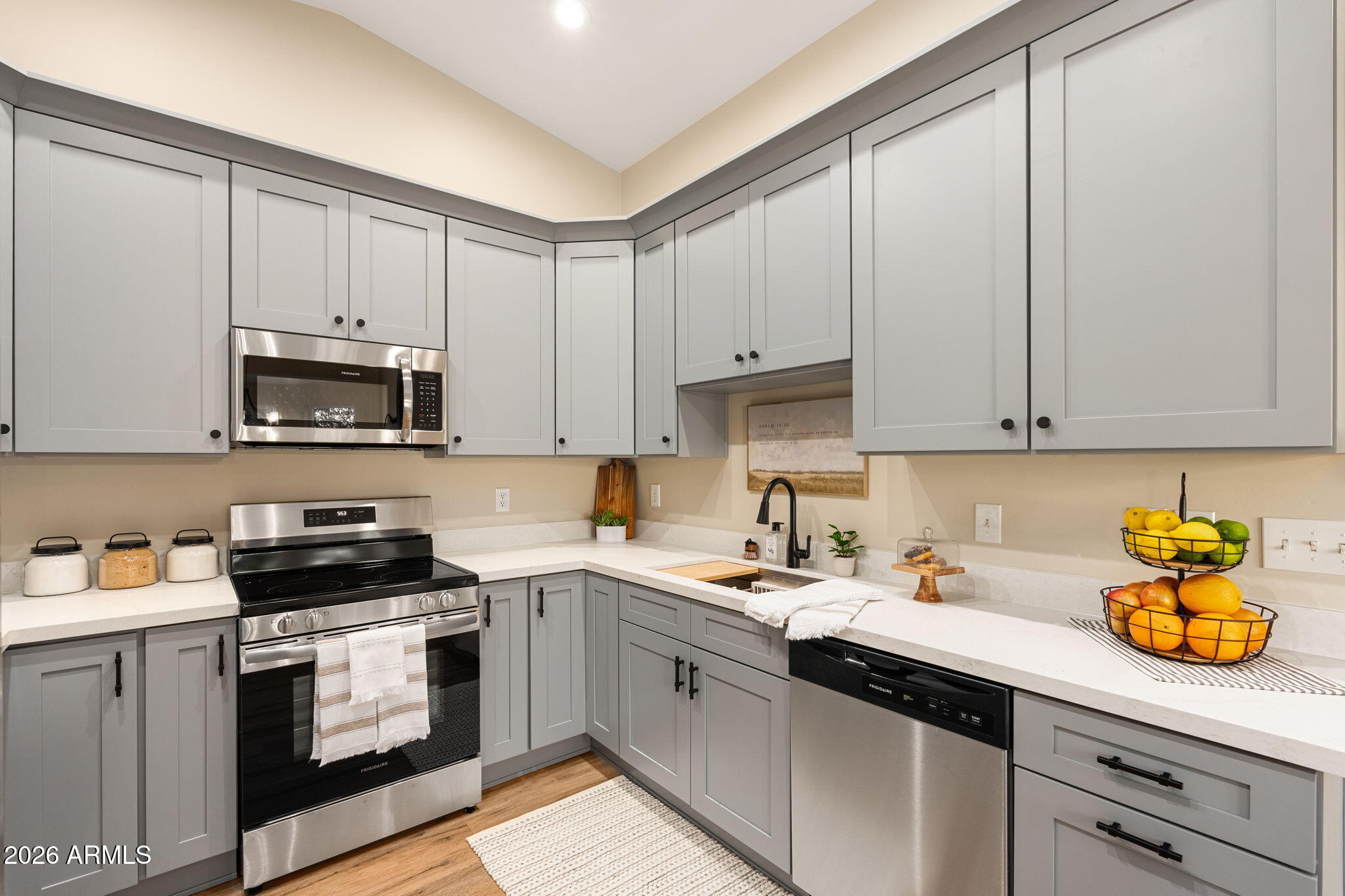 304 North Trailwood Road Payson, AZ 85541 - Photo 8 of 12 a kitchen with granite countertop white cabinets white stainless steel appliances and a sink