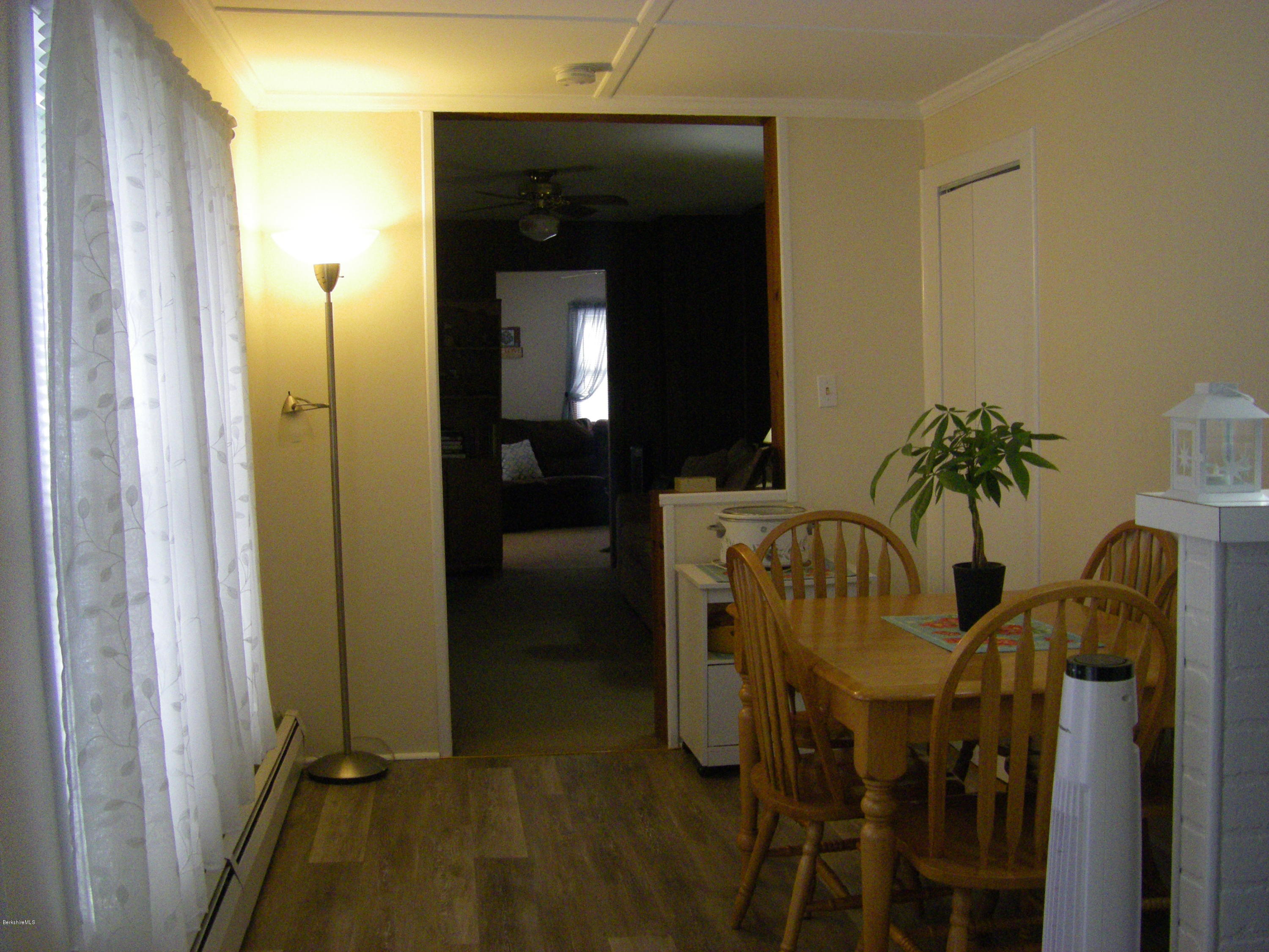 300 Cross Road Clarksburg, MA 01247 - Photo 15 of 29 a view of a hallway with furniture and floor to ceiling window