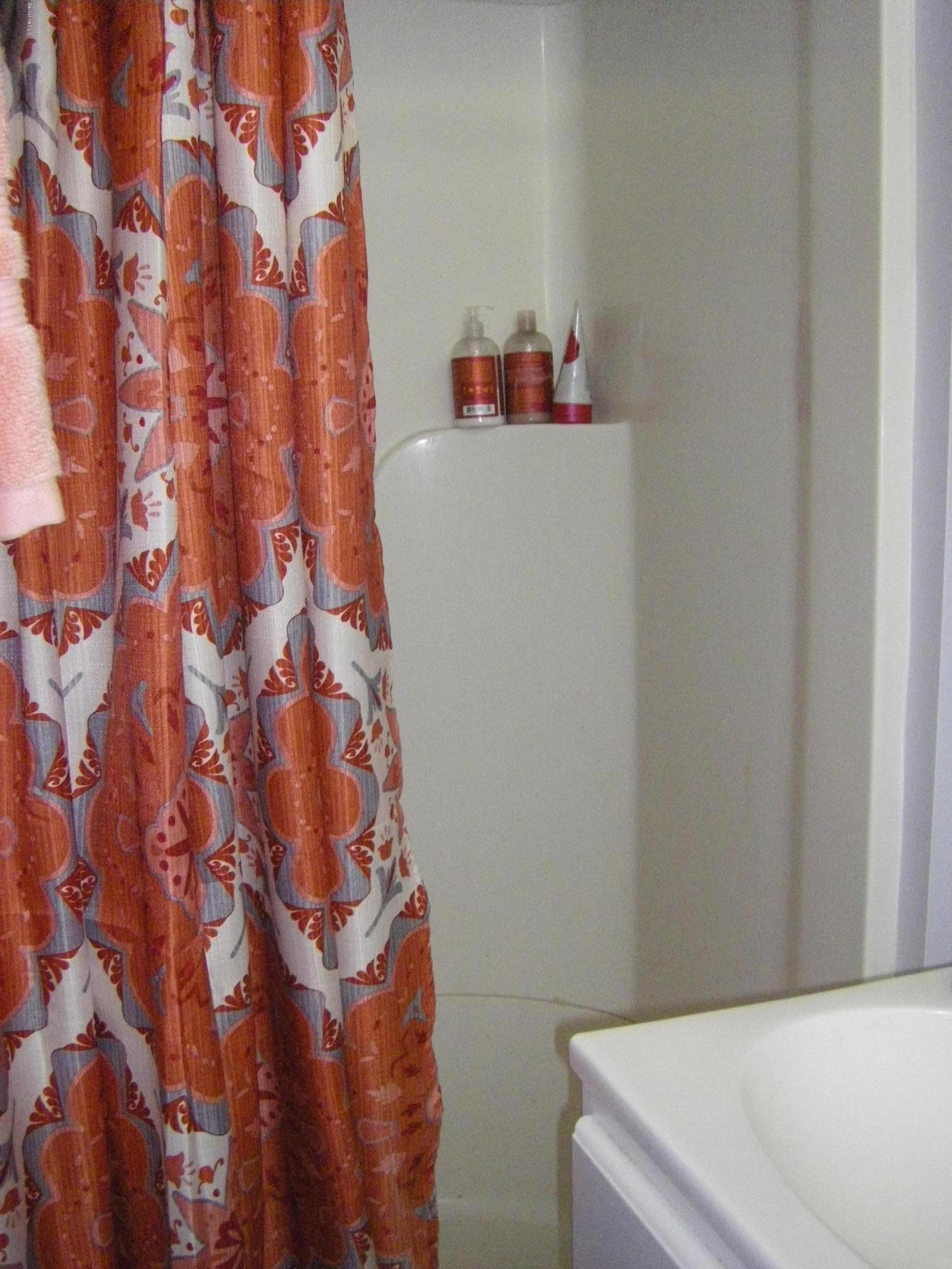 300 Cross Road Clarksburg, MA 01247 - Photo 16 of 29 a bathroom with a bathtub and shower curtain