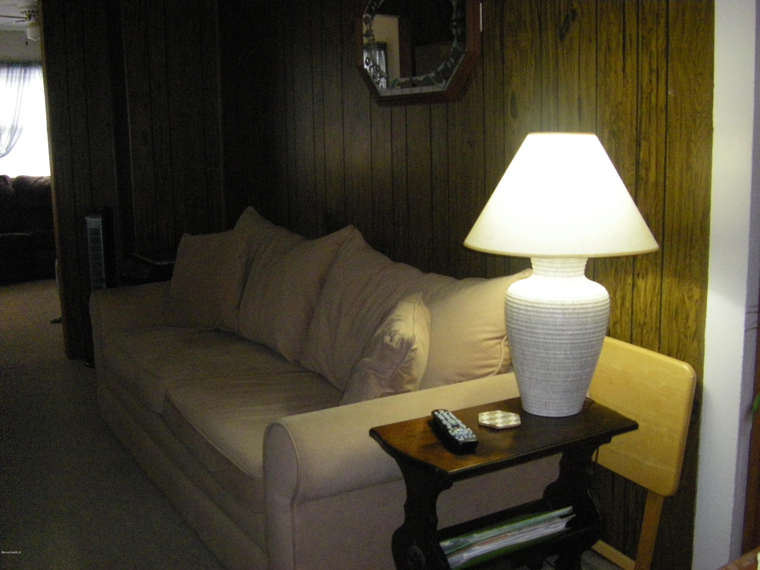 300 Cross Road Clarksburg, MA 01247 - Photo 20 of 29 a living room with furniture and a lamp