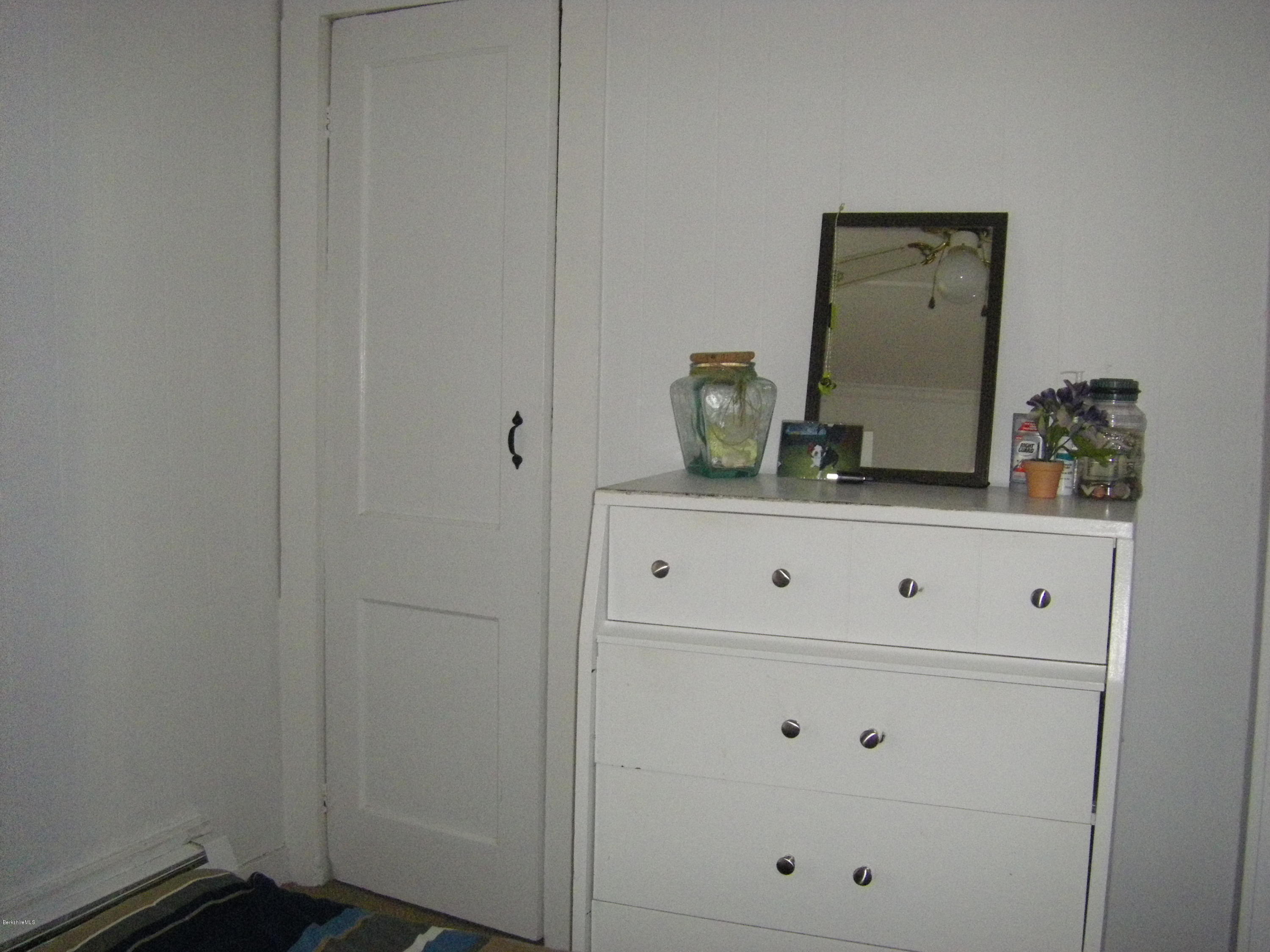 300 Cross Road Clarksburg, MA 01247 - Photo 24 of 29 a bathroom with a mirror and vanity