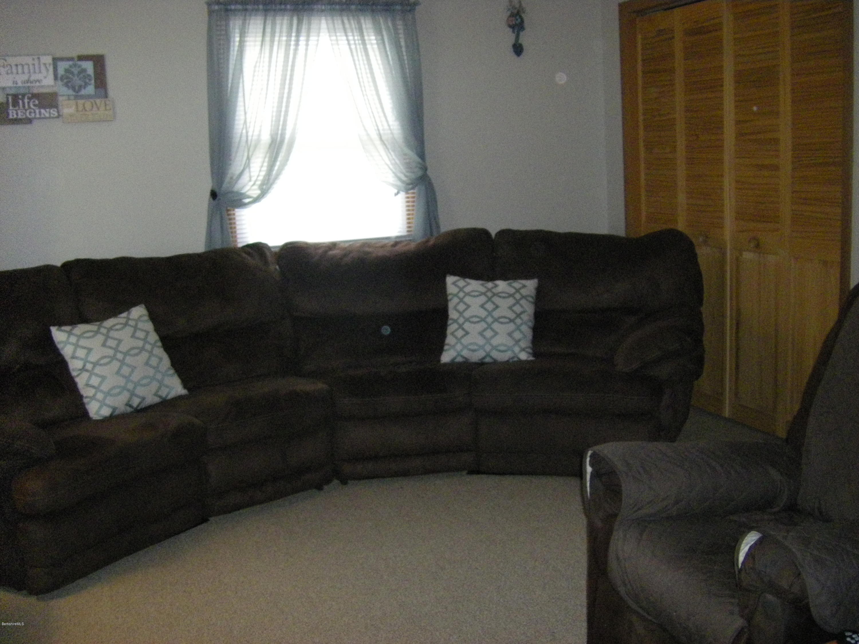 300 Cross Road Clarksburg, MA 01247 - Photo 25 of 29 a living room with furniture and a window
