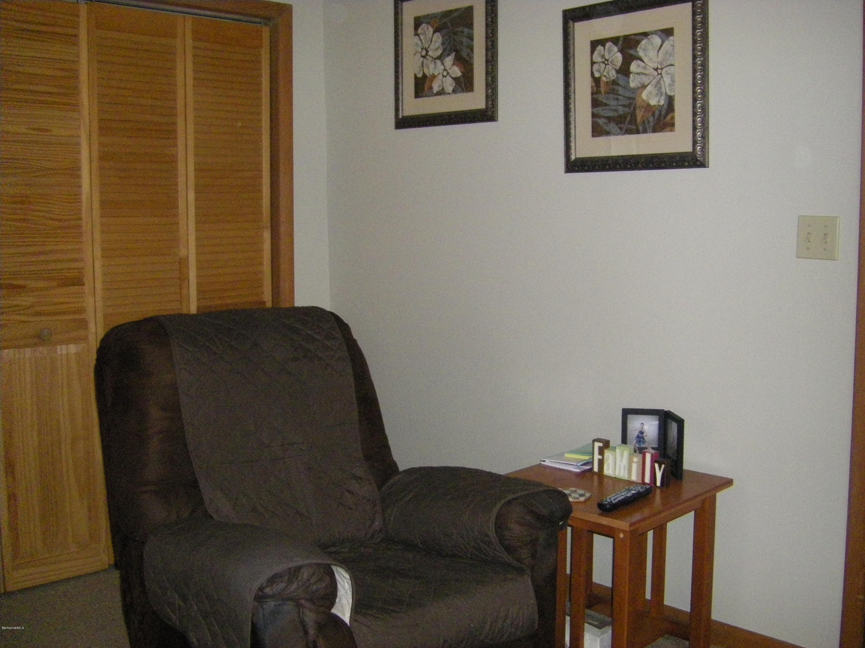 300 Cross Road Clarksburg, MA 01247 - Photo 27 of 29 a view of a workspace with furniture and a window