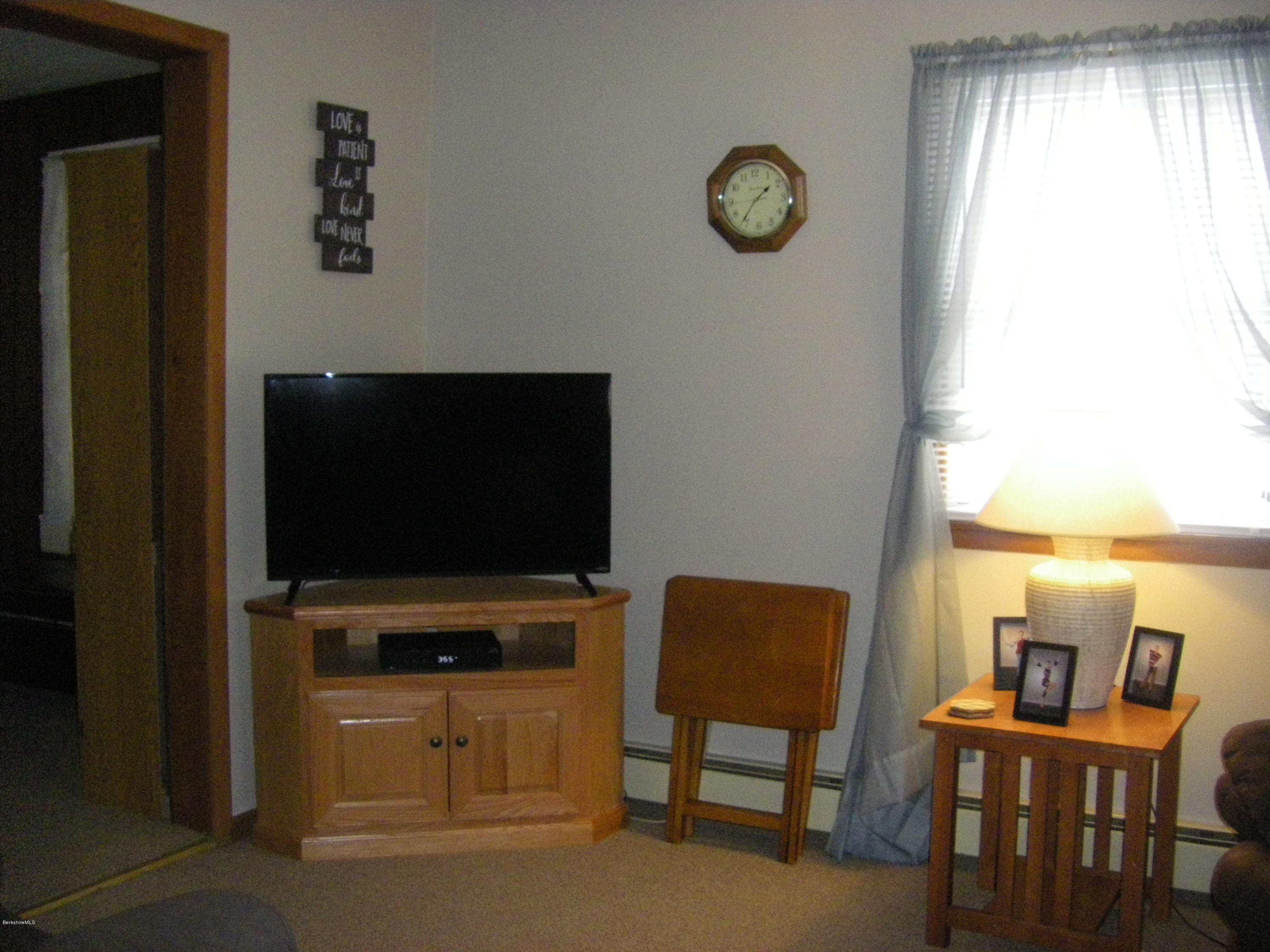 300 Cross Road Clarksburg, MA 01247 - Photo 28 of 29 a view of a livingroom with furniture and a window