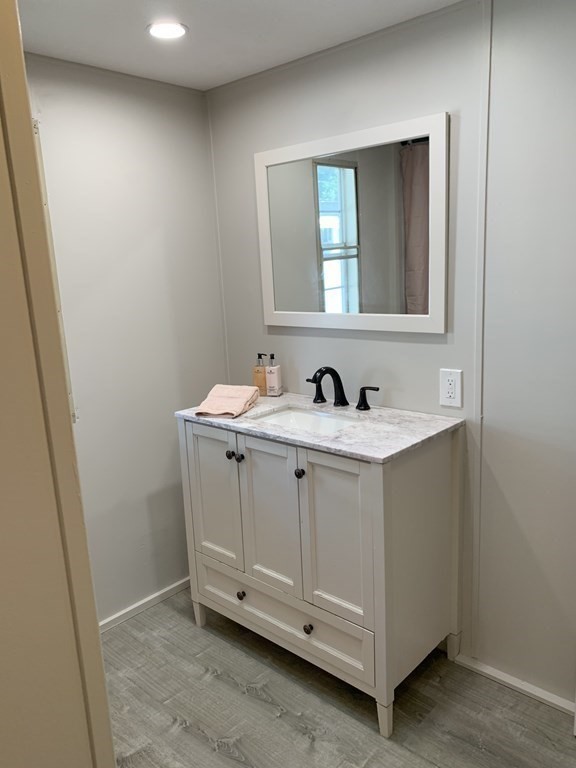 194 Lafayette Road Salisbury, MA 01952 - Photo 8 of 9 a bathroom with a sink and a mirror