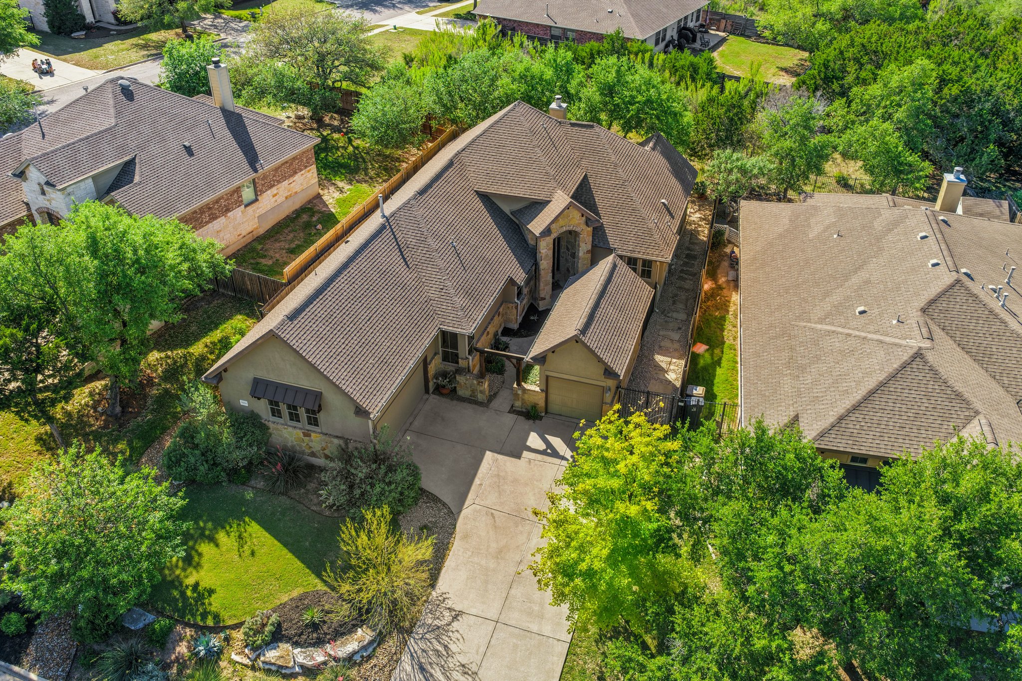 22204 Red Yucca Road Spicewood, TX 78669 - Photo 4 of 34 an aerial view of a house with a yard