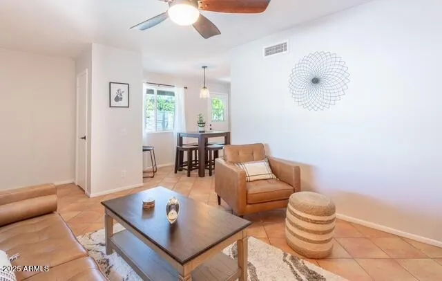 a kitchen with stainless steel appliances a refrigerator and a counter top space